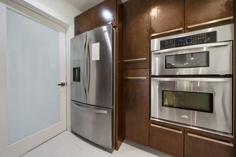 Our kitchen is a chef's dream, featuring state-of-the-art appliances and a spacious layout for culinary adventures.