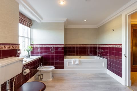 Grand Suite | Bathroom | Separate tub and shower, eco-friendly toiletries, hair dryer, bidet