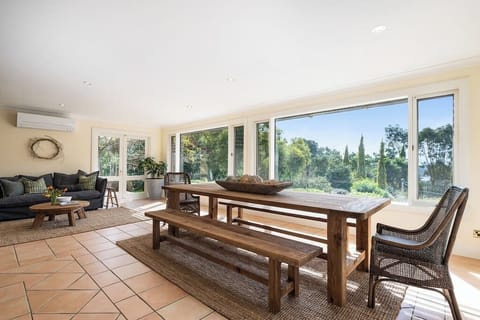 Dining & Open living area overlooking rear yard.