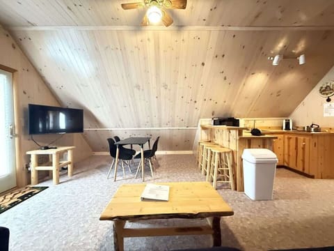 Table perfect for up to 4 people near the kitchen and living room.