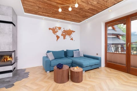 Relax in the stylish living room with a comfortable sofa and cosy decor.