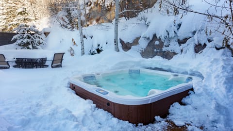 Hot tub on back patio in winter