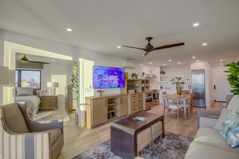 Pocket doors to the master bedroom, swivel TV and plenty of storage