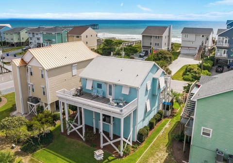 Steps to the beach + pier views from your deck—park the car and forget it!