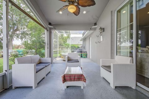 Comfortable chairs, table on the patio.