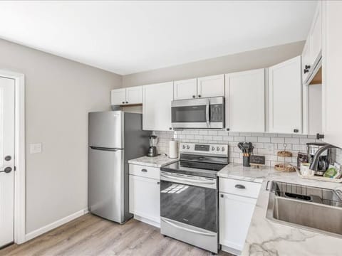 Prep and cook your favorite meals in the fully equipped kitchen.