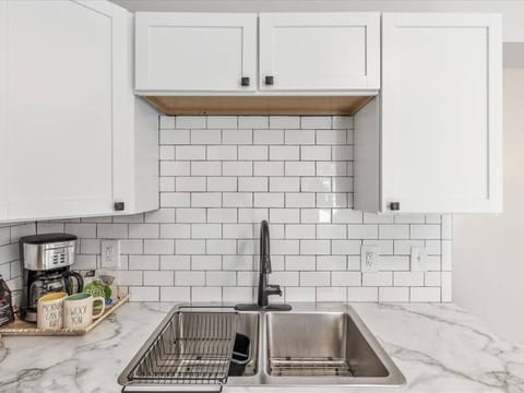 The kitchen’s double sinks are a big help for cleanup.