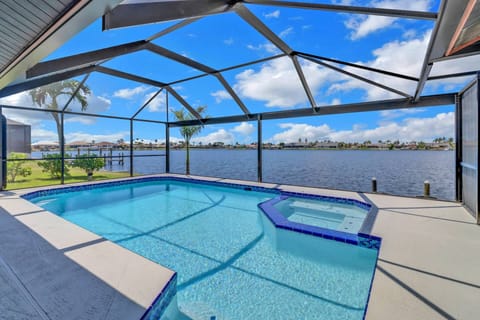 Located on Britannia Lake, in the Eight Lakes area of Cape Coral, this vacation home w/heated pool and spa is a water-lovers dream!