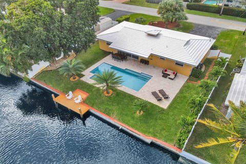 Palm Breeze Waterfront Oasis - Backyard & Canal Aerial View