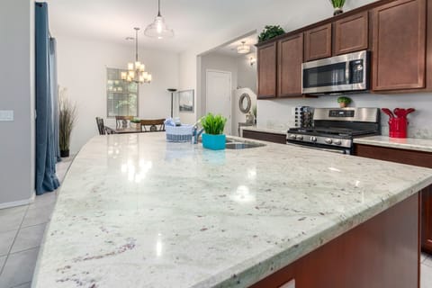 Large granite island for gatherings
and lots of granite counter for prepping.