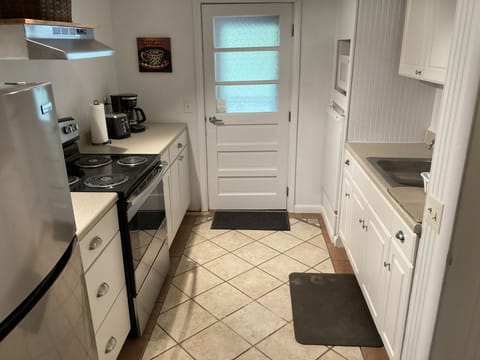 Second full kitchen downstairs.