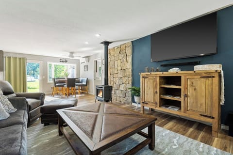 Comfortable large sofa and matching love seat with books and games. 