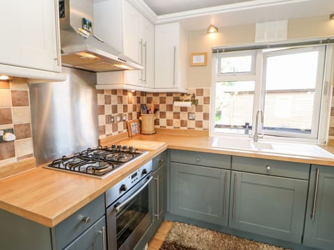 Fridge, electric kettle, toaster, cookware/dishes/utensils