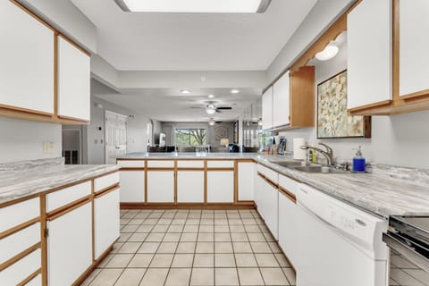Spacious and well stocked kitchen. 