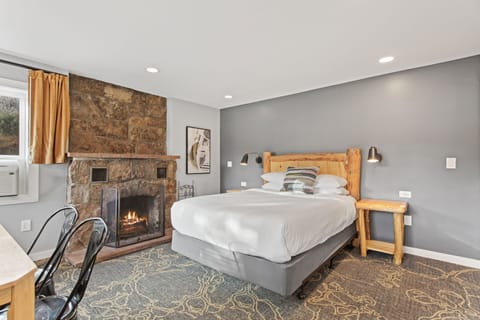 Family Suite, 2 Bedrooms | Laptop workspace, blackout drapes, iron/ironing board