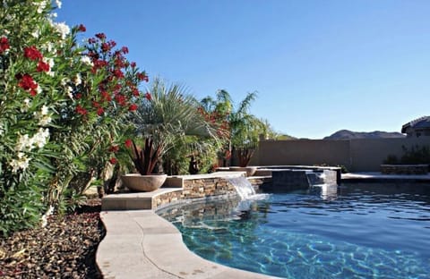 Back yard, includes pool/spa, gas firepit and BBQ 