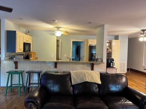 Main level open concept living area. Kitchen bar can accomodate 6 guests.