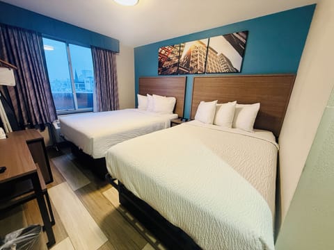 Room, 2 Double Beds, Non Smoking | 1 bedroom, in-room safe, desk, blackout drapes