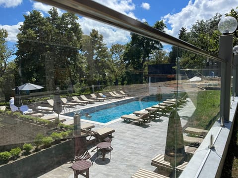 Seasonal outdoor pool, pool umbrellas, sun loungers