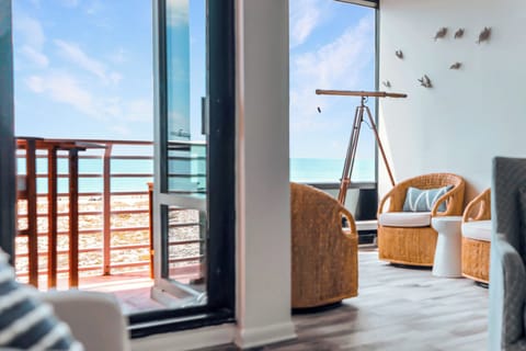 Enjoy stunning dune and Gulf vistas. Ideal for reading, conversations, and bird watching with the telescope!