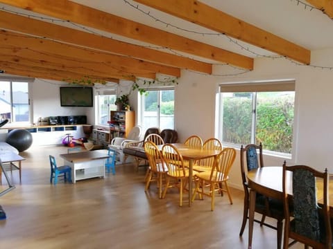 Natural light all day long in the enormous sunroom.