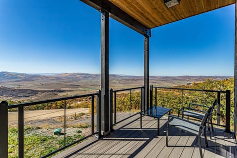 A balcony made for morning coffee and evening wine.