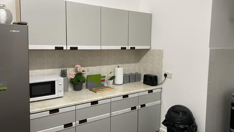 Mini-fridge, microwave, cookware/dishes/utensils