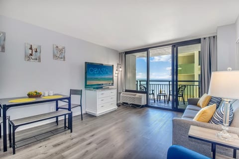 Embrace seaview elegance in our suite's living area, ensuring a luxurious stay with panoramic ocean scenes!