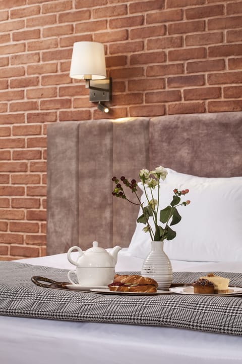 Studio | Premium bedding, down comforters, memory foam beds, free minibar