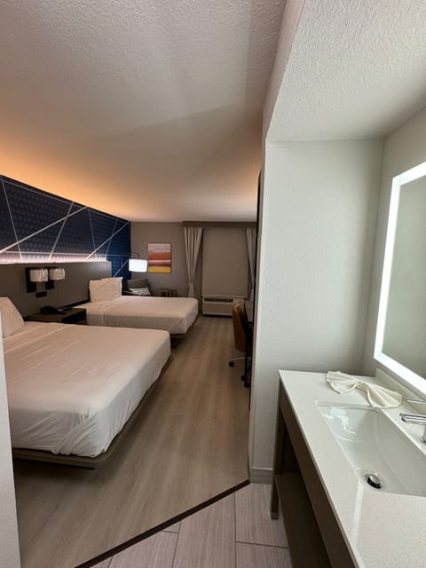 Standard Room, 2 Queen Beds, Non Smoking | 1 bedroom, in-room safe, individually decorated, individually furnished