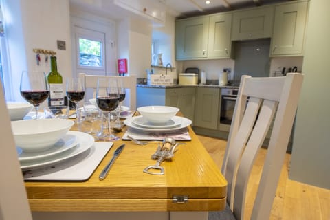 Ground floor: Kitchen with dining area seating four guests