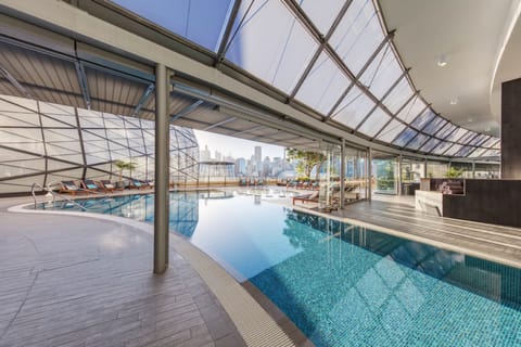 Outdoor pool, pool umbrellas, sun loungers