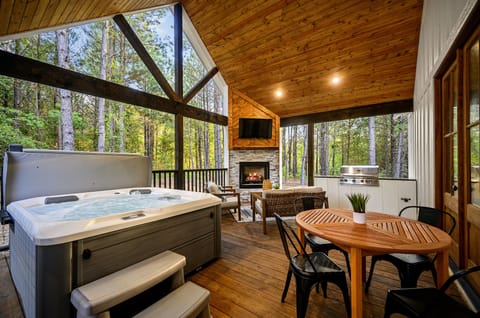Sink into the hot tub while the fireplace glows. It is just the moment you've been waiting for.