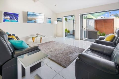 Living Room with bifold doors to the courtyard.