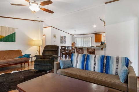 The roomy futon on the living area here comfortably sleeps two, along with the three bedrooms, that's sweet slumber space for eight!