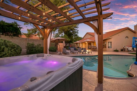 Heated pool, hot tub, putting green, bocce ball, and chessboard too!