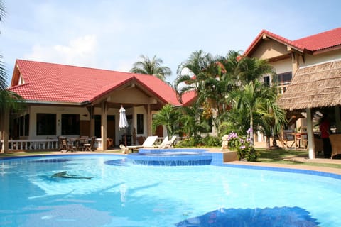 Outdoor pool, pool umbrellas, sun loungers