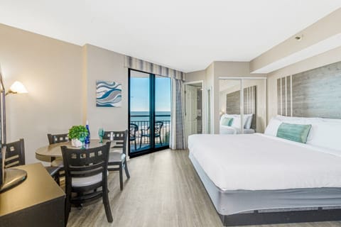 Experience a wave-kissed retreat in the oceanfront suite's bed, where the gentle sounds of waves provide a soothing lullaby for a restful and rejuvenating sleep.