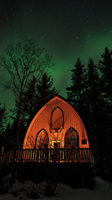 The Arc Cabin under Northern Lights

