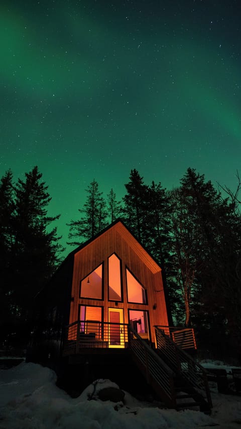 Northern lights display over the Point Cabin