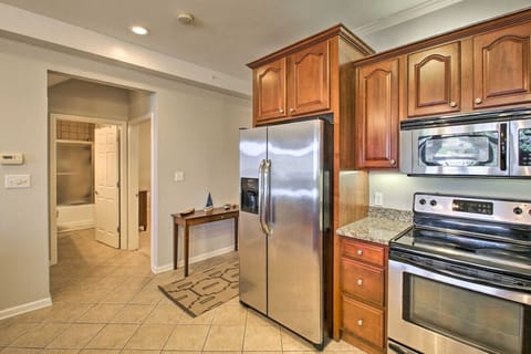 Spacious kitchen with stainless steel appliances and plenty of counter space for cooking