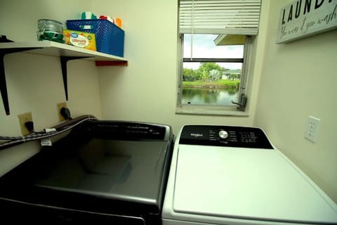Laundry Room with detergent and drying sheets