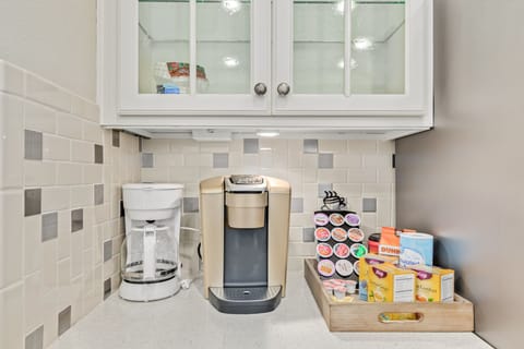 Coffee station with Keurig machine and a regular coffee maker 
