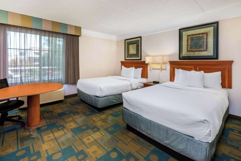 Premium bedding, desk, blackout drapes, iron/ironing board