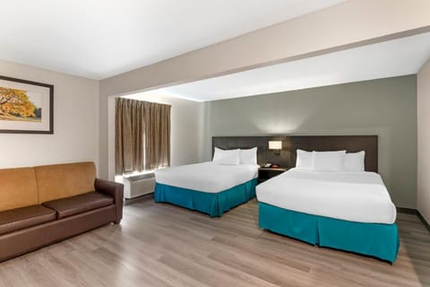 Suite, 2 Queen Beds, Non Smoking (Efficiency) | Desk, blackout drapes, iron/ironing board, free WiFi