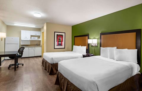 Studio Suite, 2 Double Beds, Non Smoking, Kitchen | Desk, laptop workspace, blackout drapes, iron/ironing board