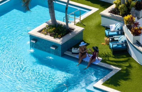 Outdoor pool, pool umbrellas, sun loungers