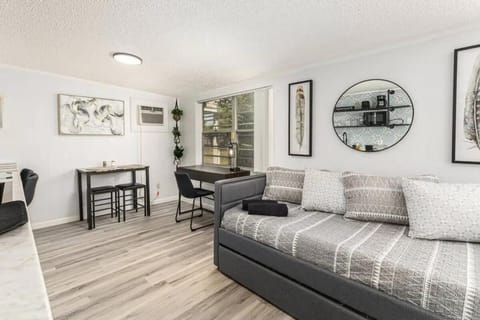 trundle bed with desk next to it