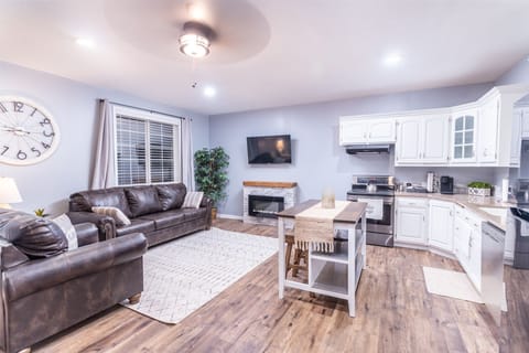 Large open floor plan with living room and full kitchen