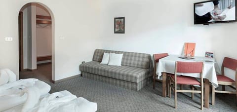 Double Room | Living area | Flat-screen TV